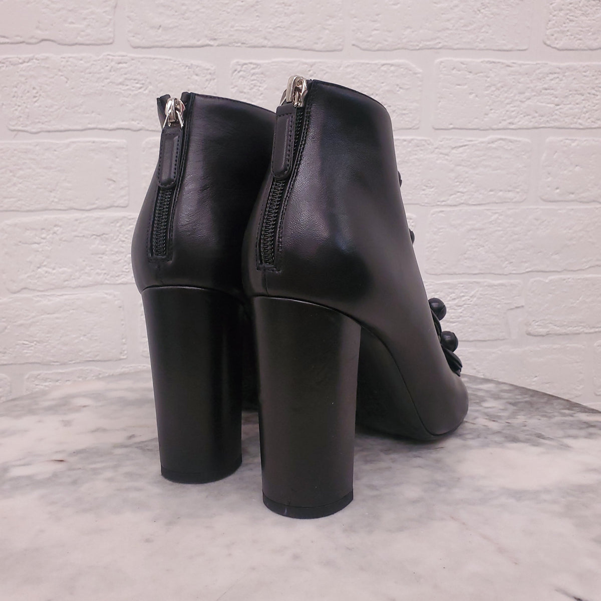 CHANEL BLACK LEATHER CAMELIA BOOTIES - SIZE 39
