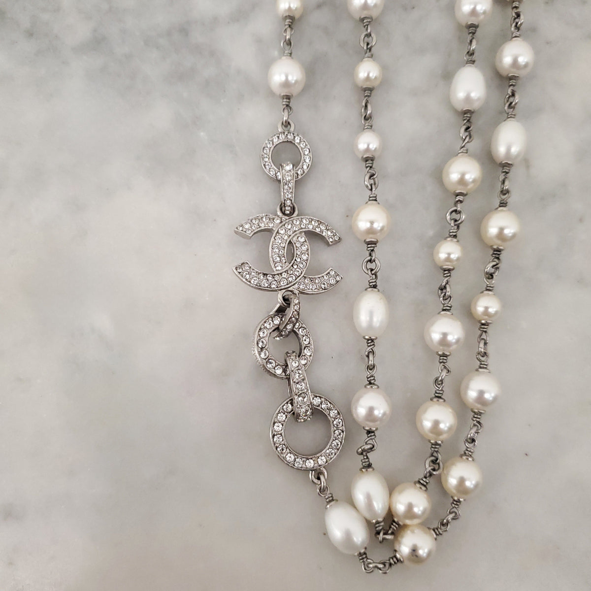 CHANEL PEARL AND SILVER CRYSTAL CHAIN LOGO NECKLACE