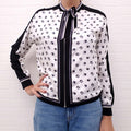 HERMÈS CREAM AND BLACK PATTERNED SILK SWEATER WITH TIE - SIZE 36