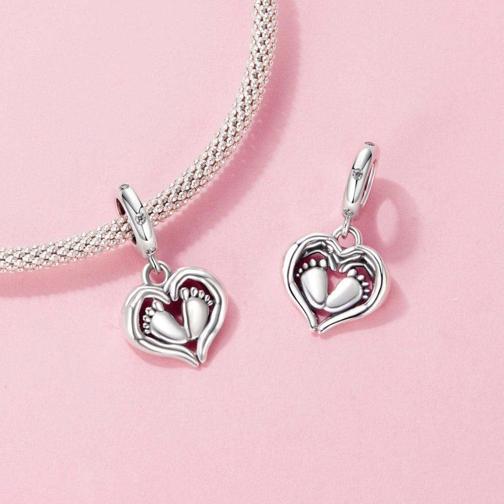 Baby Feet in Heart Hands Dangle Charm