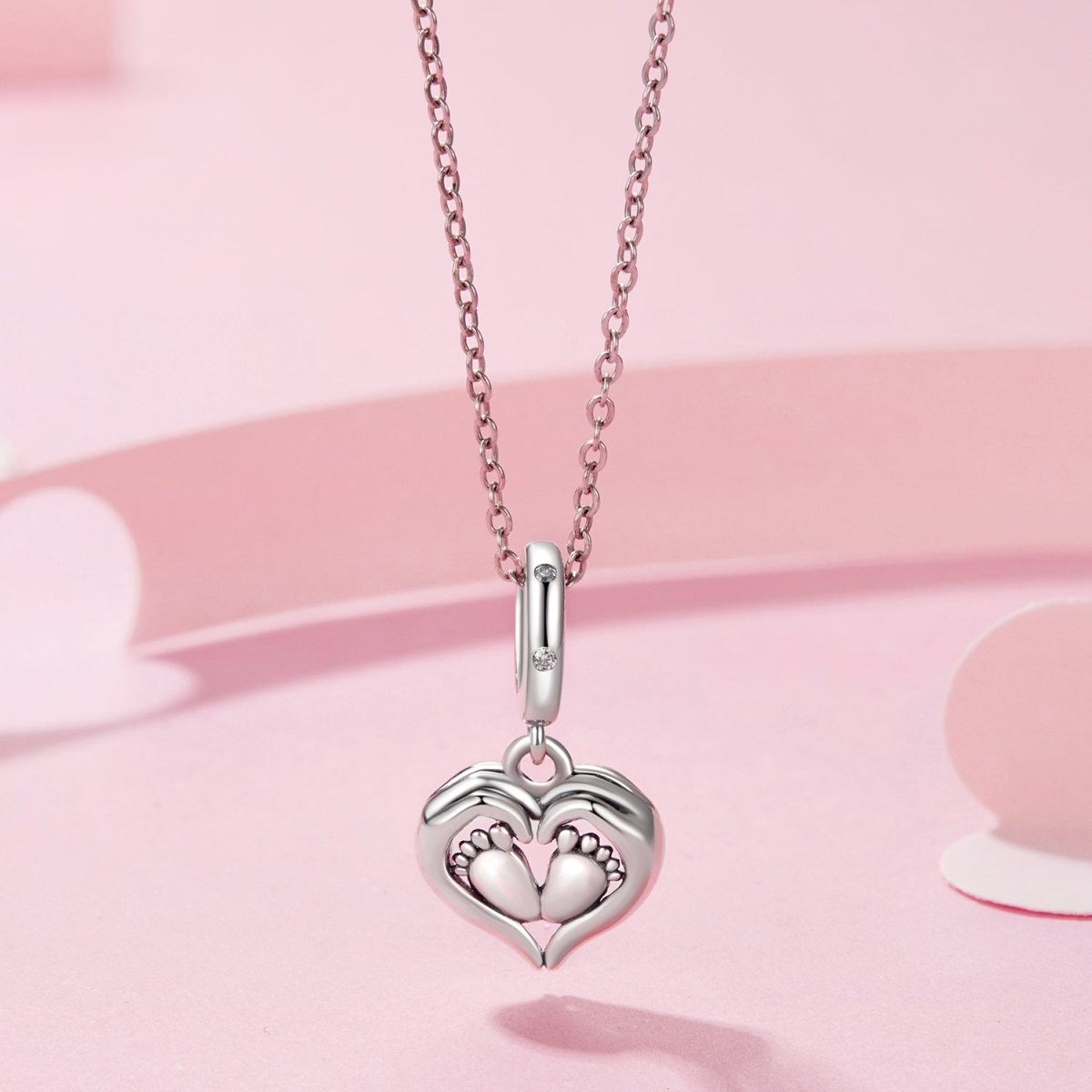 Baby Feet in Heart Hands Dangle Charm