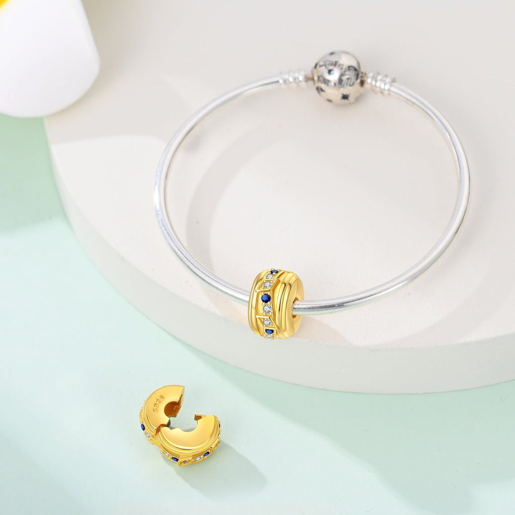 Golden Geometric with Blue and Clear Stones Clip Charm