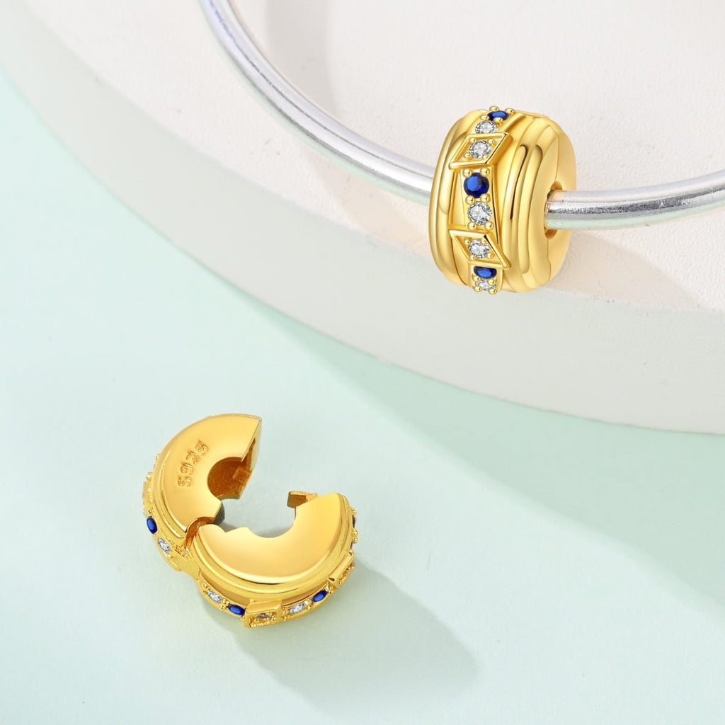 Golden Geometric with Blue and Clear Stones Clip Charm